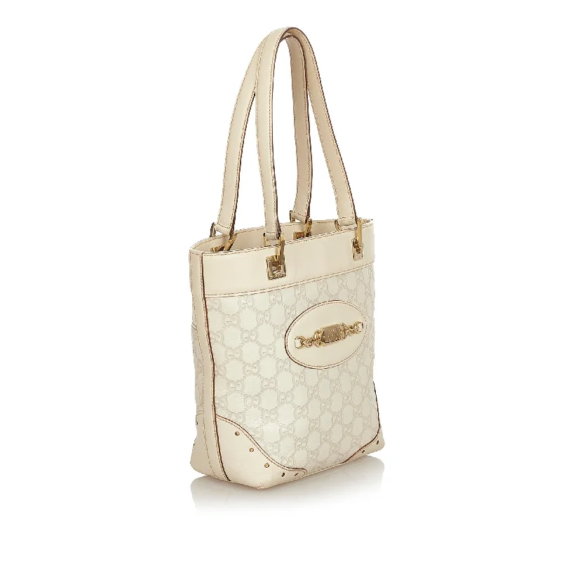 Gucci tote bags for women with a spacious interiorGucci Guccissima Punch Tote Bag (25493)