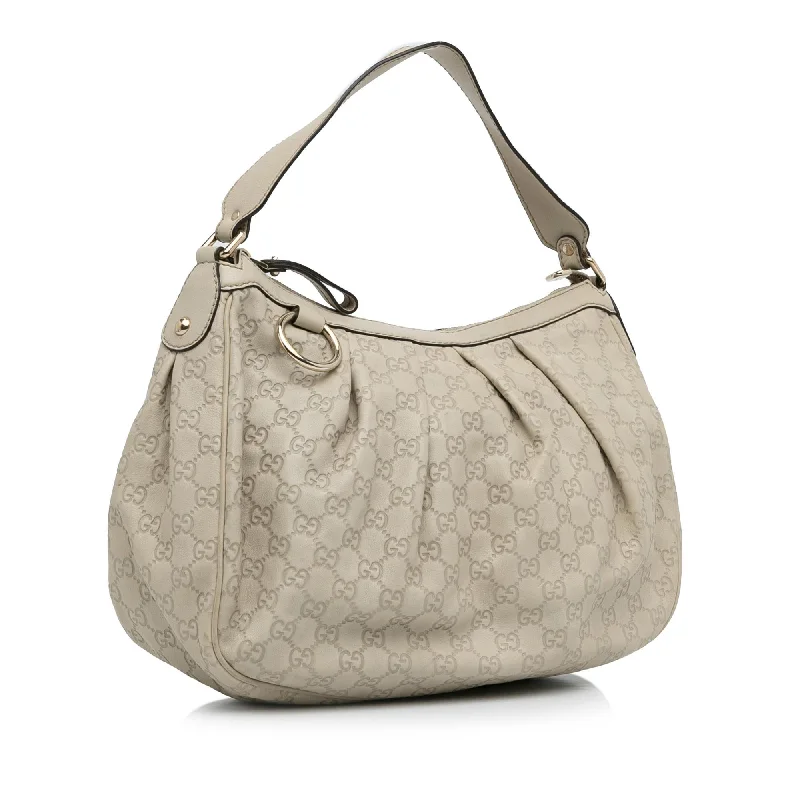 Gucci Marmont bags for women with a contrast - colored interiorGucci Guccissima Sukey (LS9Q7r)